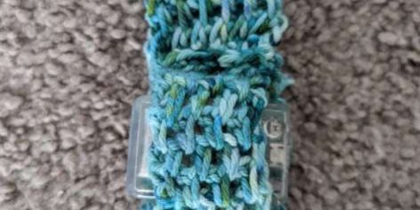 PXL_20230323_205629958 A close up picture of a blue armband holding the gyro device my project uses.